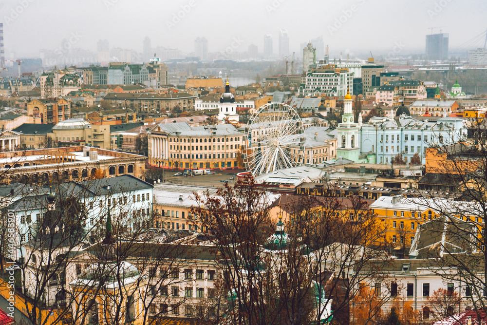 Aerial top view on building roofs of Podil district , Kiev city, Kyiv cityscape, capital of Ukraine