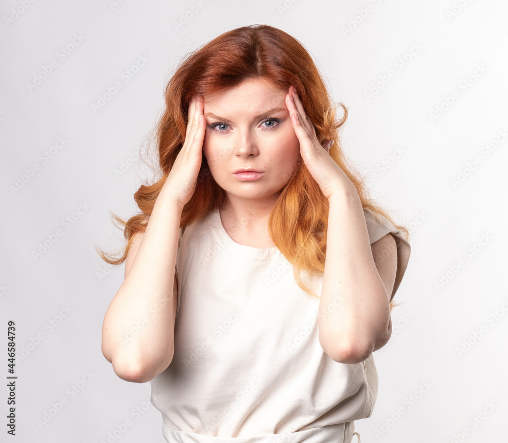 Young woman suffering from headache