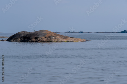 A small skerry. An island in the background in the horizon. © Marko Hannula