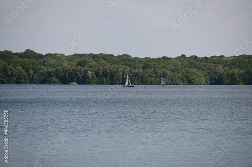 sailing boat on a beautiful lake on a sunny summerday in belgium