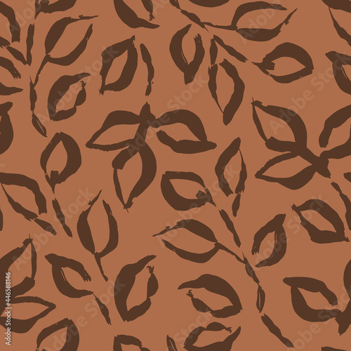 Hand drawn vector seamless pattern with leaves and branches. Realistic painted brush strokes ornament in earth brown color.