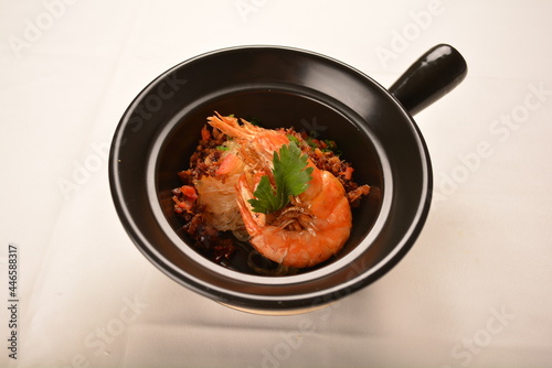 stir fried spicy chilli sauce big tiger prawn with grass vermicelli noodle mee in black clay hot pot asian halal menu