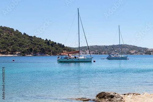 Sailing boats anchored in the wonderful, shallow, turquoise bay of Rogoznica, Croatia, popular tourist and nautical destination