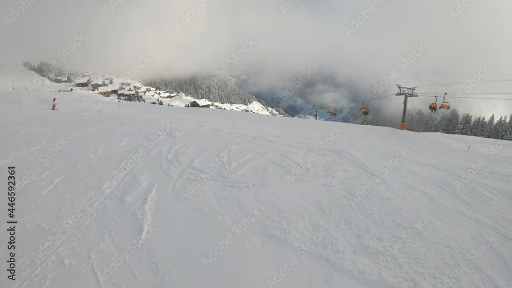Onboard Cam from a descent on the ski slope. There are a few clouds in the sky but the weather is nice. Downhill skiing on Bettmeralp Onboard Cam from a descent on the ski slope. There are a few clouds in the sky but the weather is nice. Downhill skiing on Bettmeralp