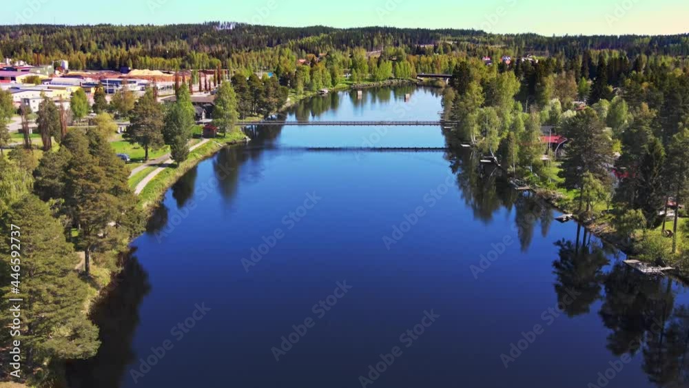Calm Waters Of Vasterdal River In Vansbro, Dalarna, Sweden - aerial shot Calm Waters Of Vasterdal River In Vansbro, Dalarna, Sweden - aerial shot