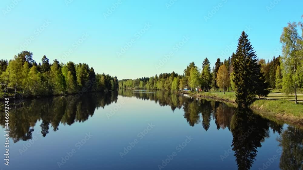 Tranquil Scenery Of Vasterdal River In Vansbro, Dalarna, Sweden At Daytime - aerial pullback Tranquil Scenery Of Vasterdal River In Vansbro, Dalarna, Sweden At Daytime - aerial pullback