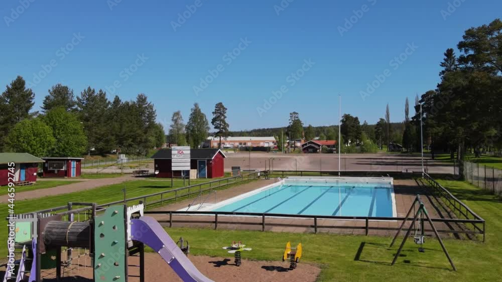 Public Swimming Pool In Vansbro, Dalarna, Sweden - drone shot Public Swimming Pool In Vansbro, Dalarna, Sweden - drone shot