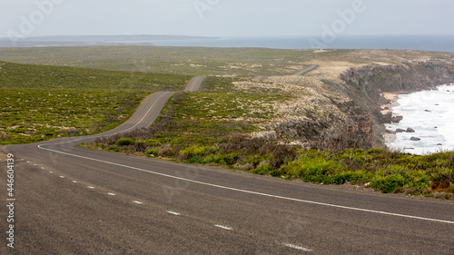 The iconic Boxer road leading down to the iconic remarkable rocks on kanagaroo island south australia taken on may 10th 2021 photo