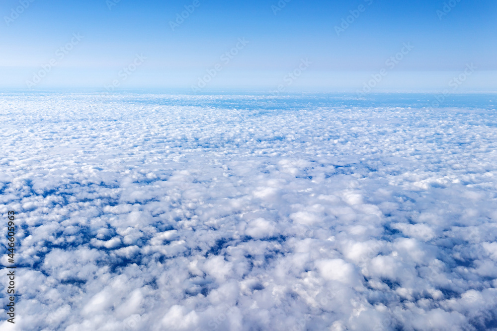 View of a cloud with a blue sky from the window. With space to copy text