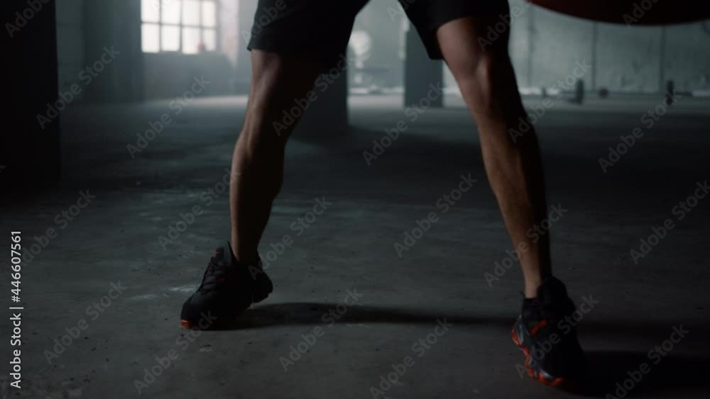 Man actively moving during training. Boxer boxing with punch bag Man actively moving during training. Boxer boxing with punch bag