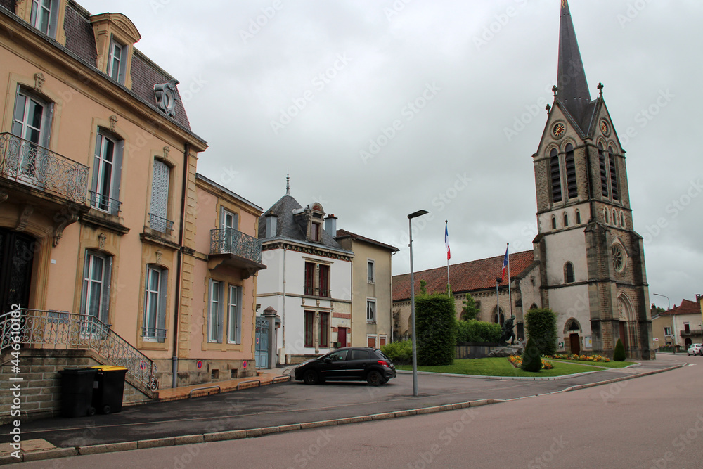 houses and saint-rémy church in vittel in lorraine (france) 
