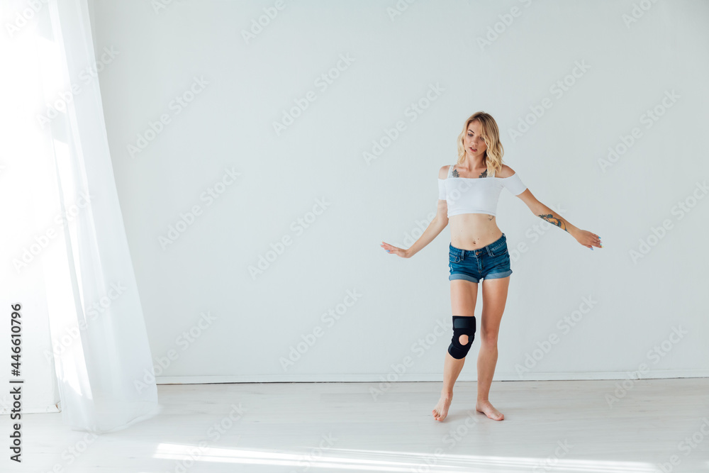beautiful blonde woman dancing to music in training beautiful blonde woman dancing to music in training