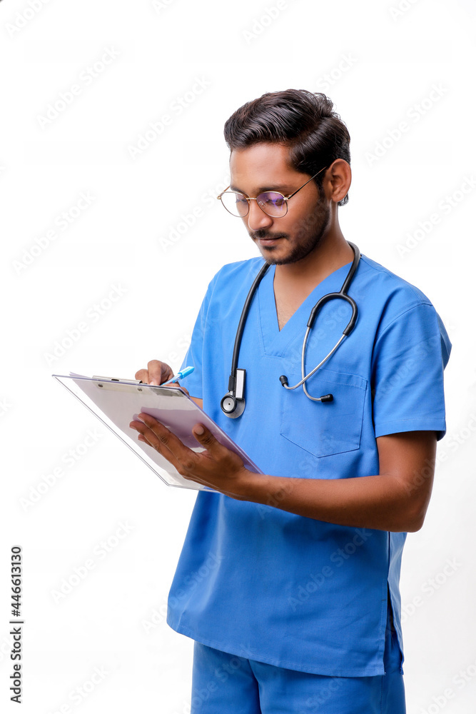 Young indian male doctor dressed in uniform with stethoscope tak
