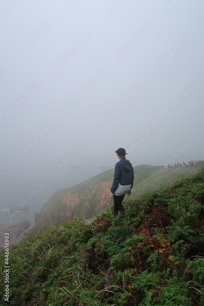 loneliness man in hiking mountain foggy weather trip