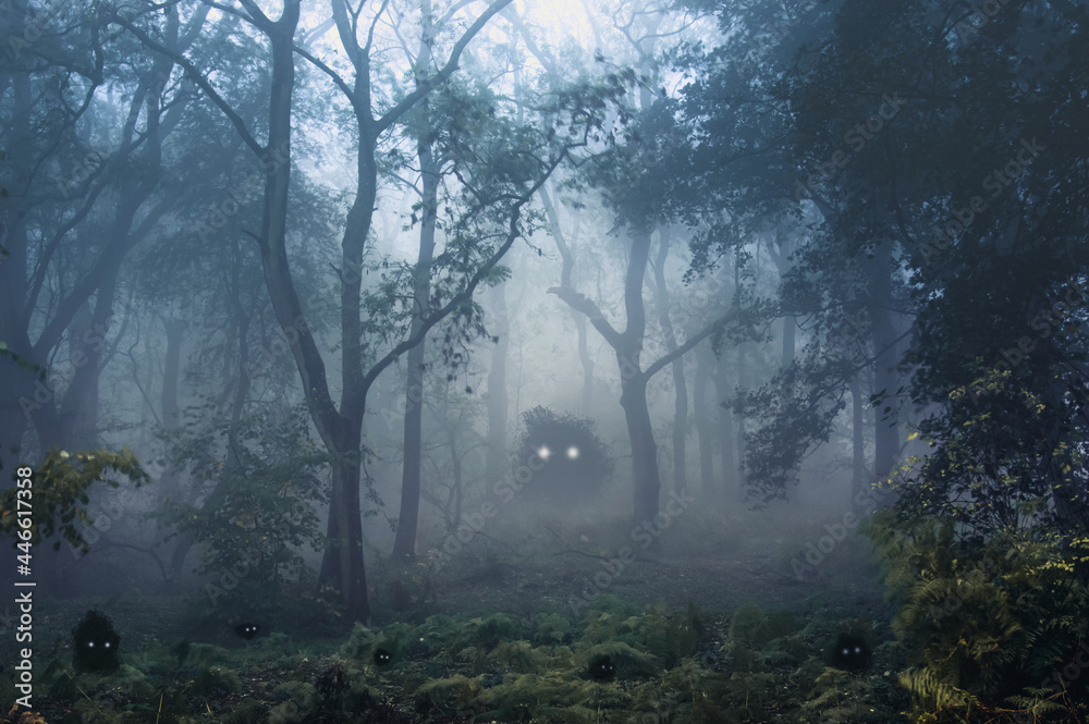 A creepy, fantasy forest of trees, back lighted with spooky, glowing eyes of creatures in the undergrowth.