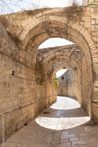 Stone  arched connections on the quiet small St James Street in the Armenian quarter in the old city of Jerusalem  Israel