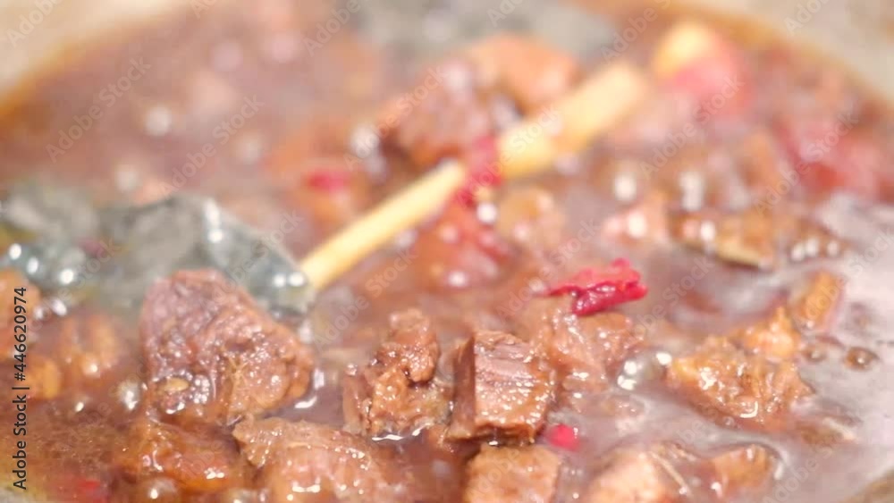 close up stewing beef in the pan. selective focus. close up stewing beef in the pan. selective focus.