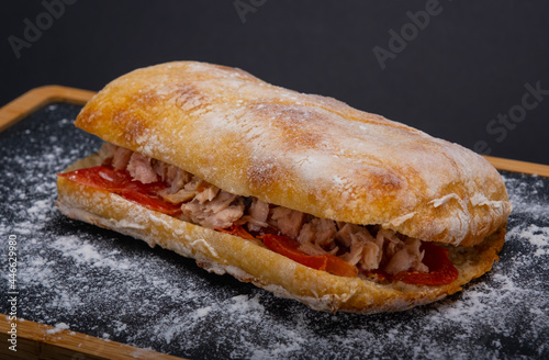 Ciabatta sandwich with tuna, cream cheese and tomatoes