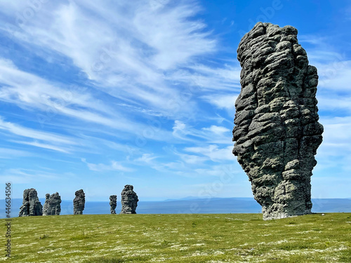 Stone pillars of weathering on the Manpupuner mountain plateau in the Komi Republic in Russia in summer in clear weather
