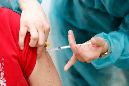 COVID-19 vaccination center, man receiving Covid 19 vaccination, Saint-Gervais, France