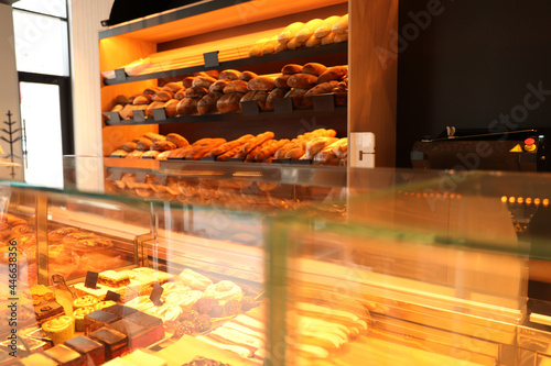 Fresh pastries on counter in bakery store