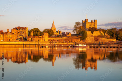 View across the River Medway to Rochester Castle and Cathedral at sunset, Rochester, Kent, England photo