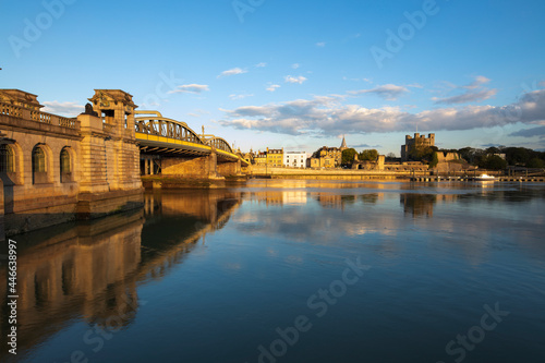 Rochester Bridge over the River Medway to the old town and Norman Castle, Rochester, Kent, England photo