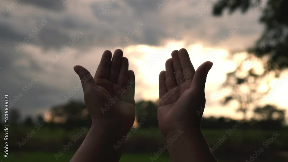 B roll 4k. of Human hands open palm up worship god with sunset like hope. Eucharist Therapy Bless God Helping Repent Catholic Easter Lent Mind Pray. Christian Religion concept background. Victory god. B roll 4k. of Human hands open palm up worship god with sunset like hope. Eucharist Therapy Bless God Helping Repent Catholic Easter Lent Mind Pray. Christian Religion concept background. Victory god.