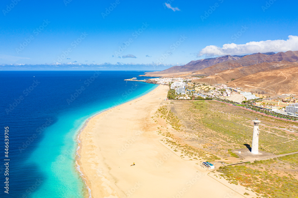 Aerial view of fine sand beach and lighthouse, Morro Jable, Fuerteventura, Canary Islands, Spain Aerial view of fine sand beach and lighthouse, Morro Jable, Fuerteventura, Canary Islands, Spain