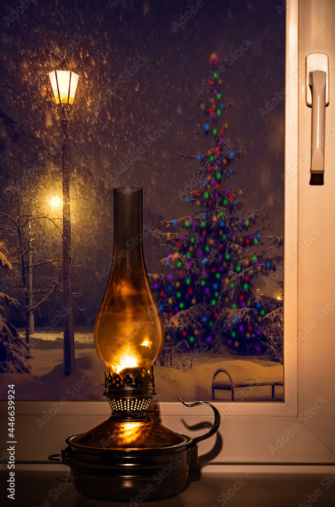 kerosene lamp on the windowsill kerosene lamp on the windowsill