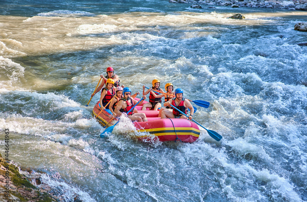 rafting on a stormy mountain river in summer - obrazy, fototapety, plakaty 