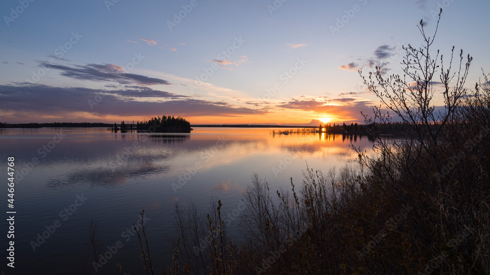 Colourful sunset in Spring at Astotin Lake, Elk Island National Park, Alberta, Canada Colourful sunset in Spring at Astotin Lake, Elk Island National Park, Alberta, Canada