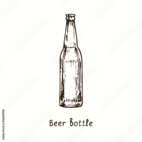 Beer bottle retro vintage style. Ink black and white doodle drawing in woodcut style. photo