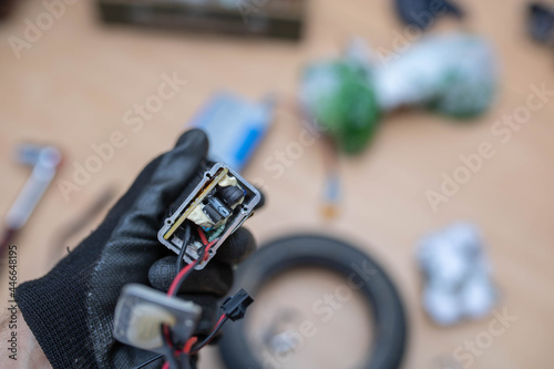 repair of the electric scooter power supply controller.