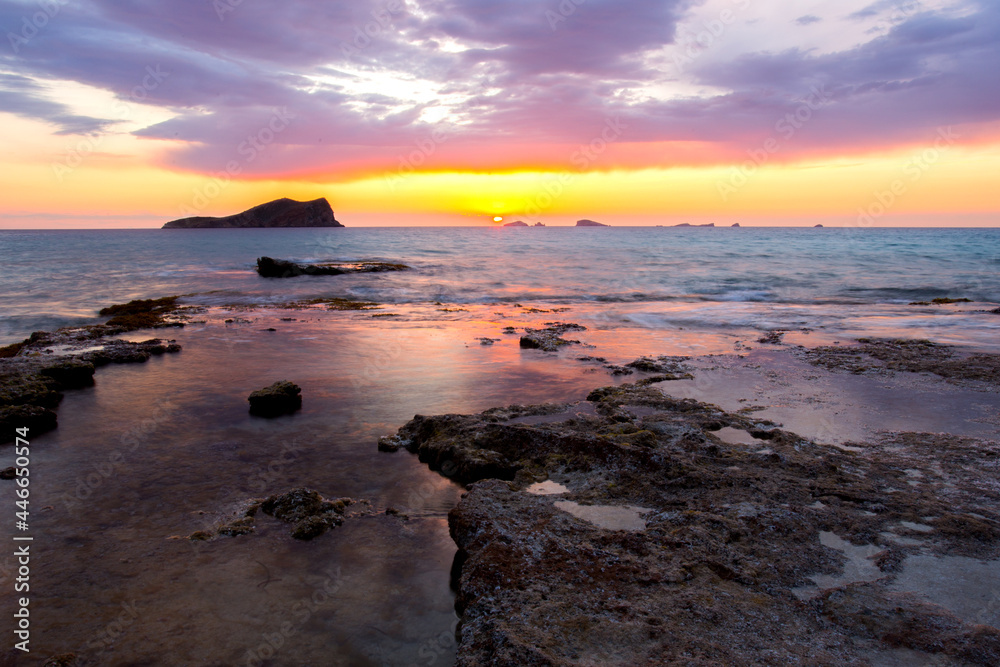 Cala Compte sunset. Beautiful crystal clear beach in Ibiza