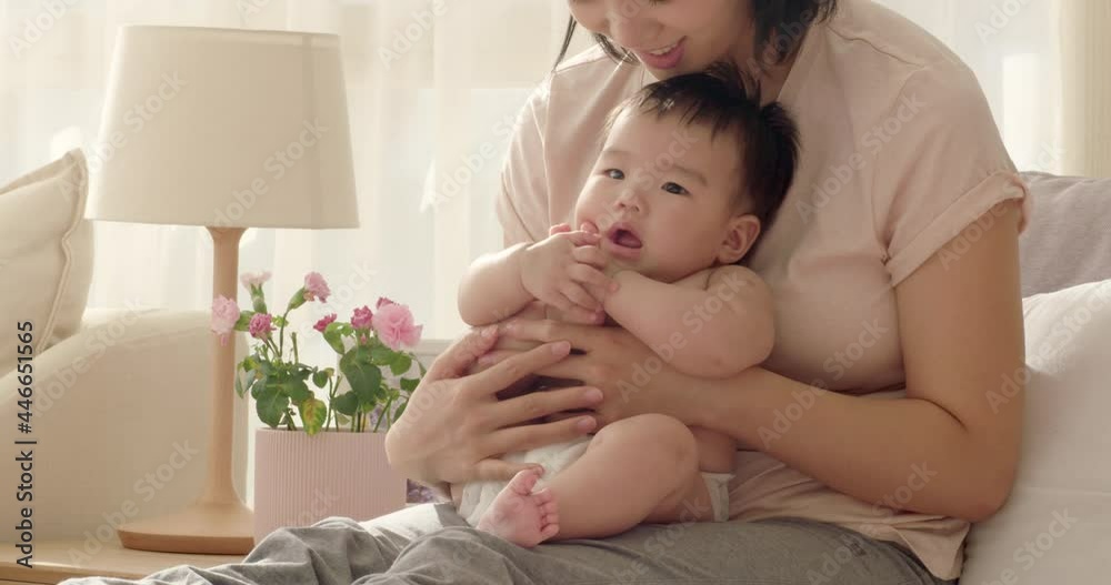Young mom holding baby girl,4K Young mom holding baby girl,4K