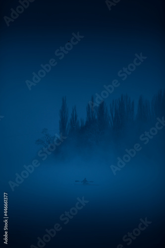 rowing on the river in the fog