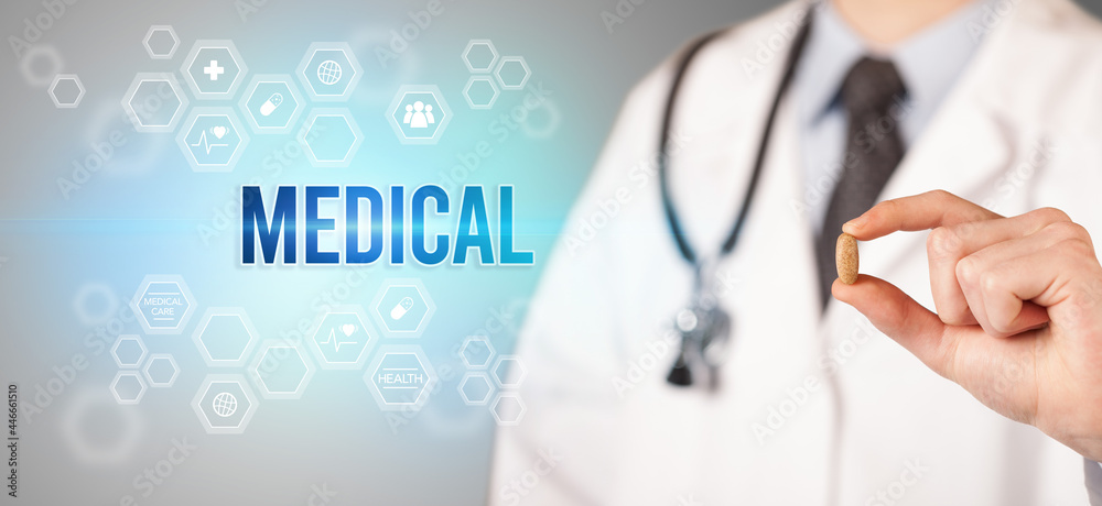 Close-up of a doctor giving you a pill Close-up of a doctor giving you a pill