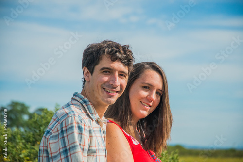 Happy, Confident Couple looking at camera