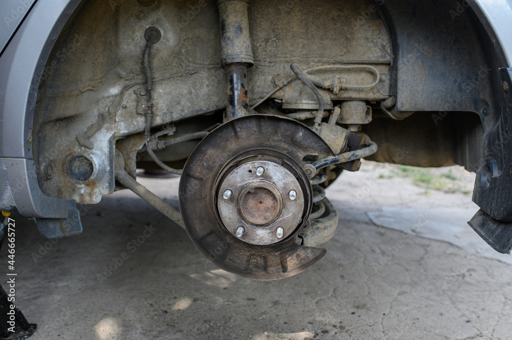 View of the old brake mechanism of the rear right wheel of the car View of the old brake mechanism of the rear right wheel of the car
