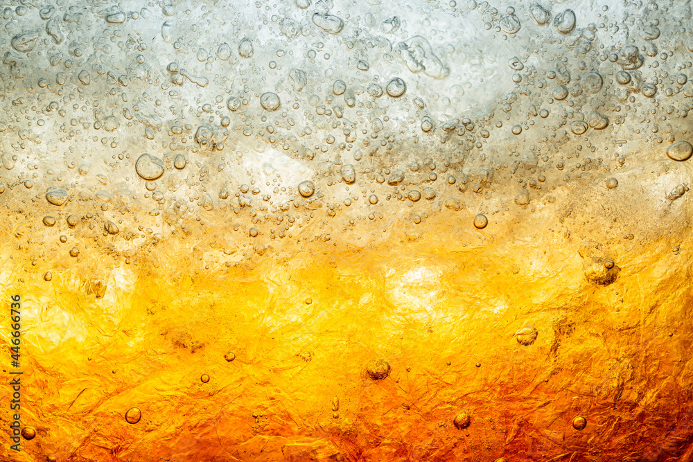 macro cola,Background of cola with ice and bubbles macro cola,Background of cola with ice and bubbles