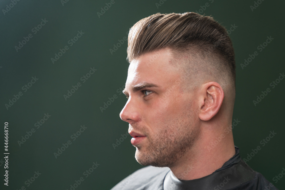 Portrait of a young unshaven man with a beautiful hairstyle Portrait of a young unshaven man with a beautiful hairstyle