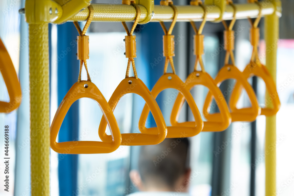Yellow triangle handrails on buses. Yellow triangle handrails on buses.