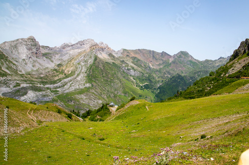 Meadows, lakes, rivers, woods and mountains in the Aragonese Pyrenees bordering the French border
