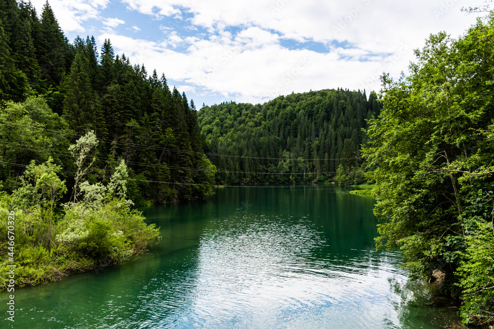 Scropoasa Lake, an artificial dam lake in the Bucegi Mountains, on the valley of the Ialomita River. Romania.