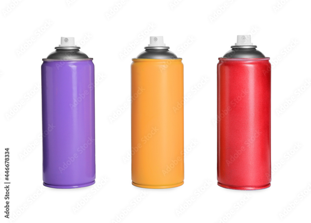 Cans of different spray paints on white background. Graffiti supplies Cans of different spray paints on white background. Graffiti supplies