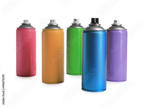 Cans of different spray paints on white background. Graffiti supplies