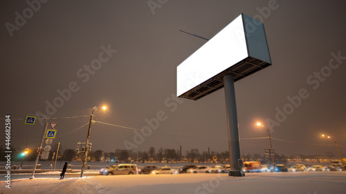 Billboard at night in winter