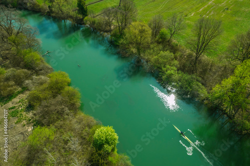 Aerial view of river Ljubljanica and lonely boat, Slovenia © tynrud