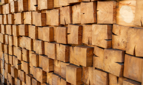 Wooden  textured wall lined with wooden cubes  longitudinal cuts of a fir tree. Cubes in the dioganal projection.